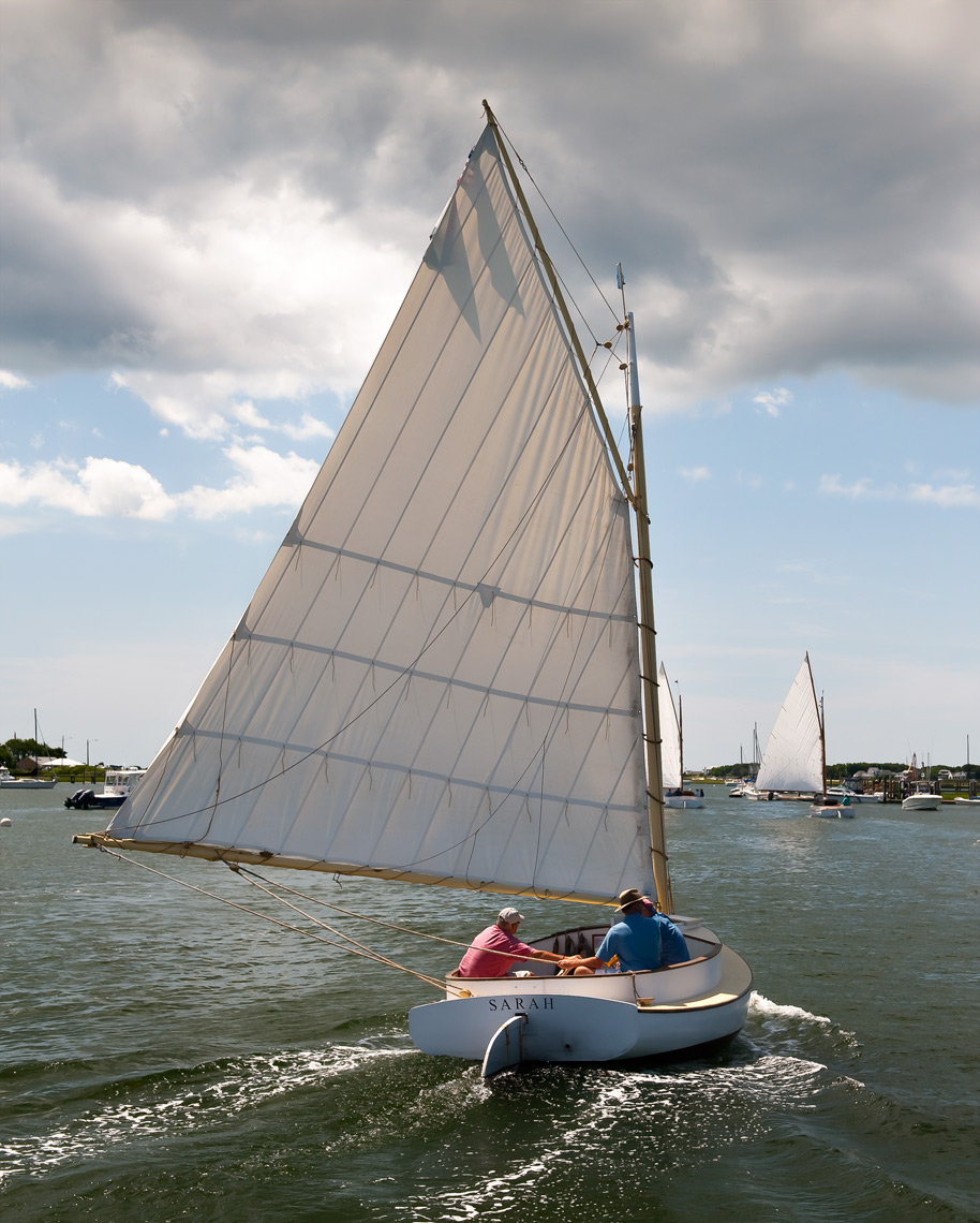 Old wooden catboat named Sarah in Bass River, Cape Cod